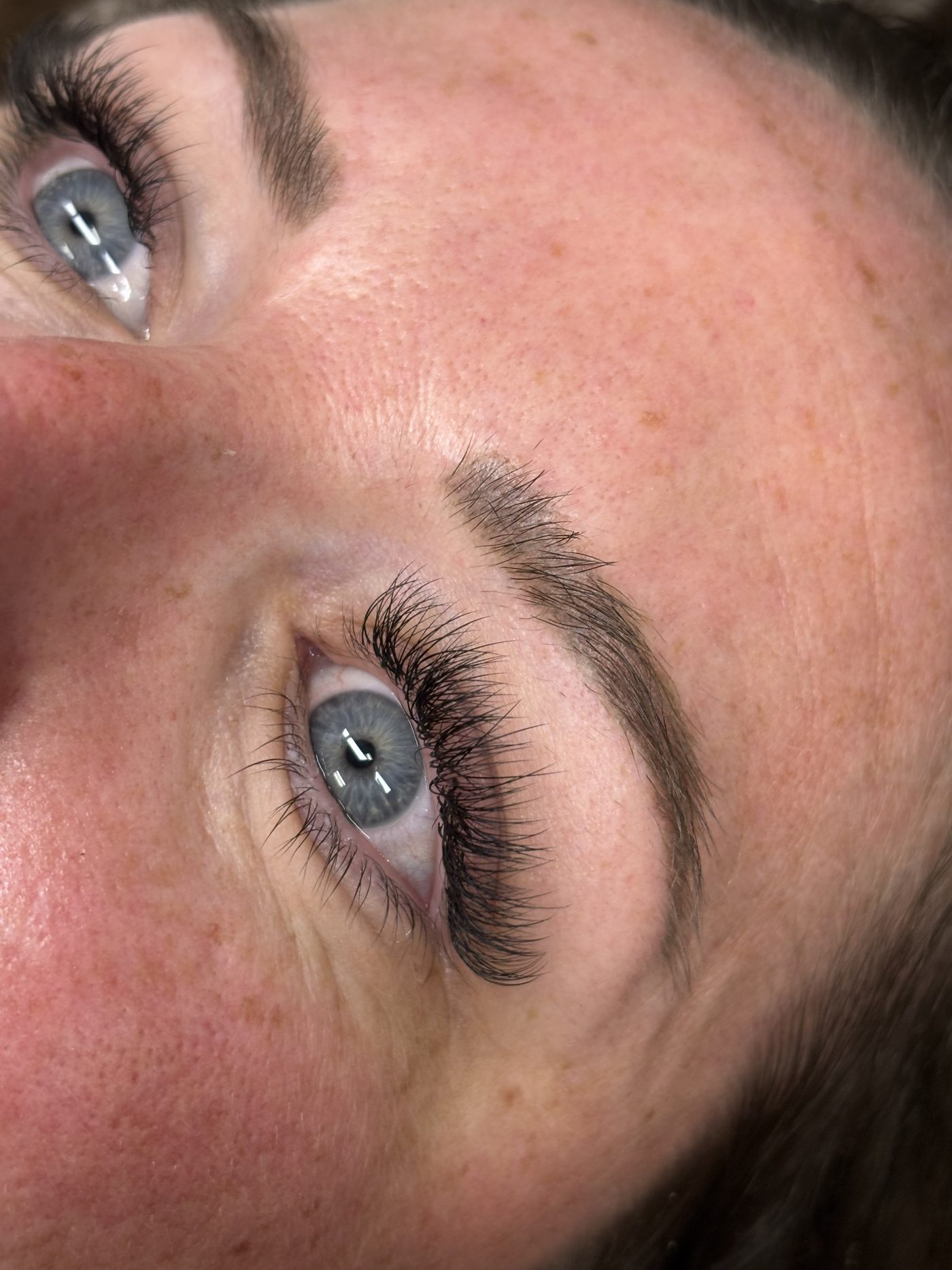 Close-up of a full lash extension set by Ellie