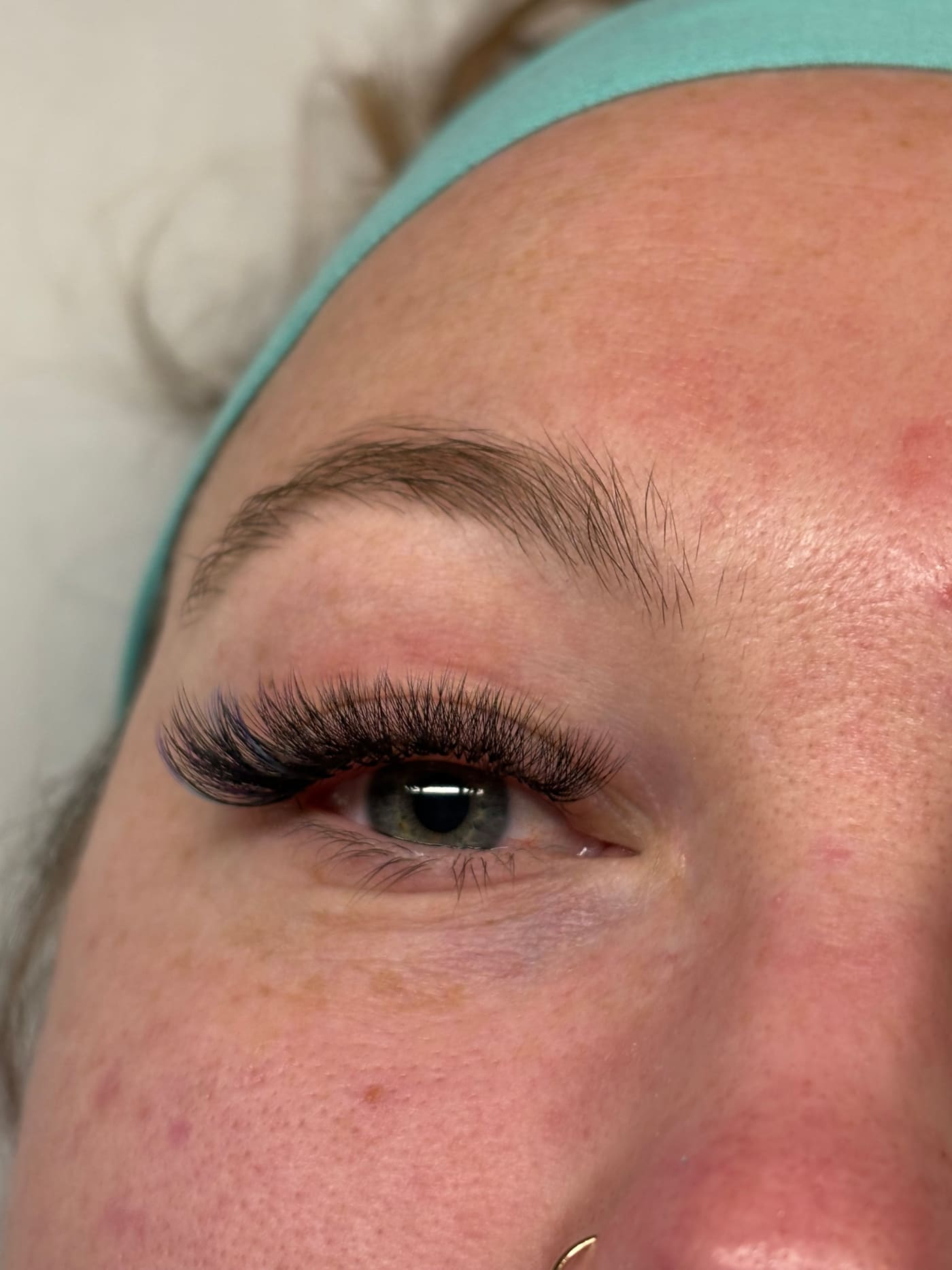 Close-up of a dramatic volume lash extension set by Ellie