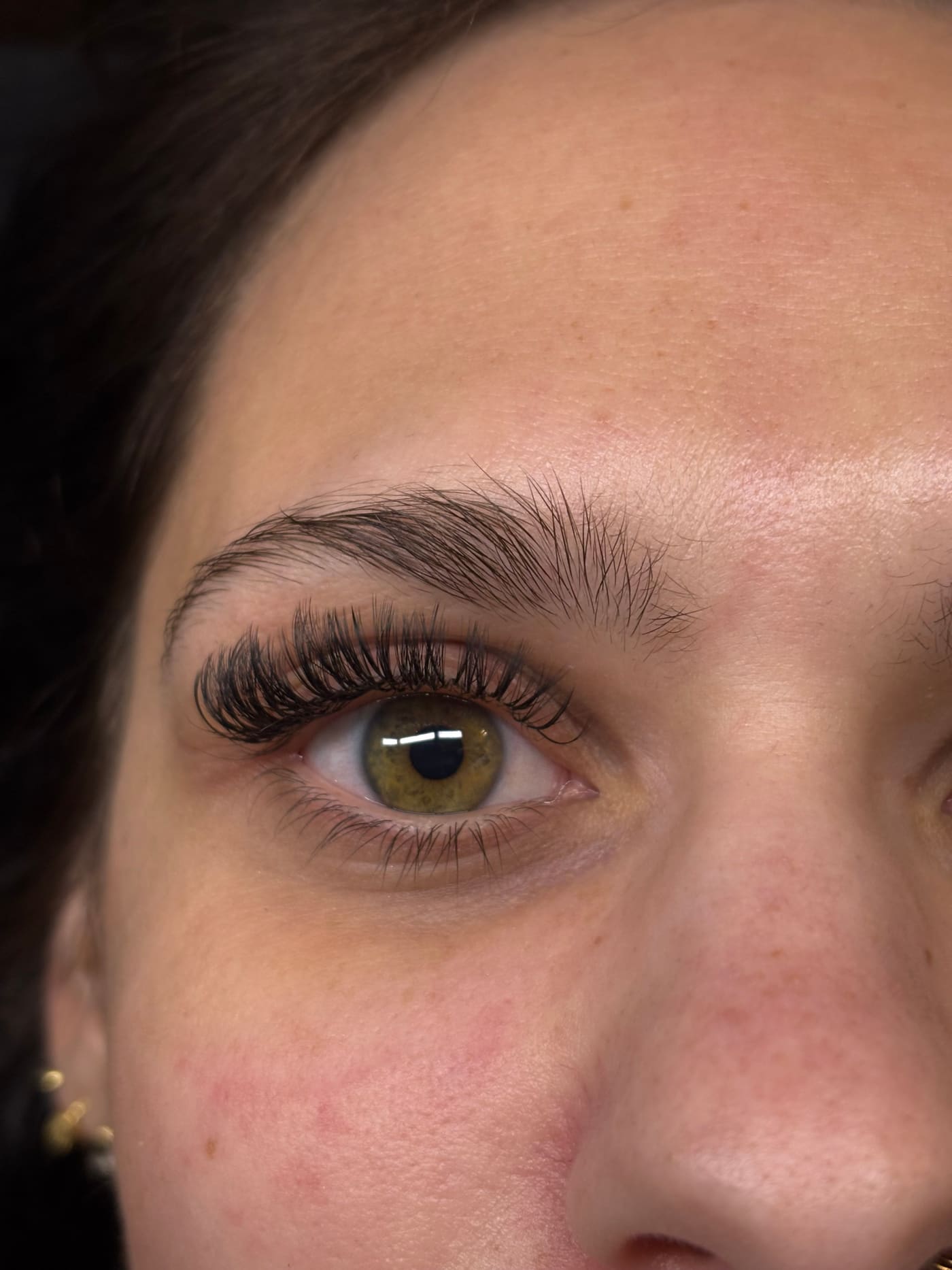 Close-up of a full volume lash extension set by Ellie