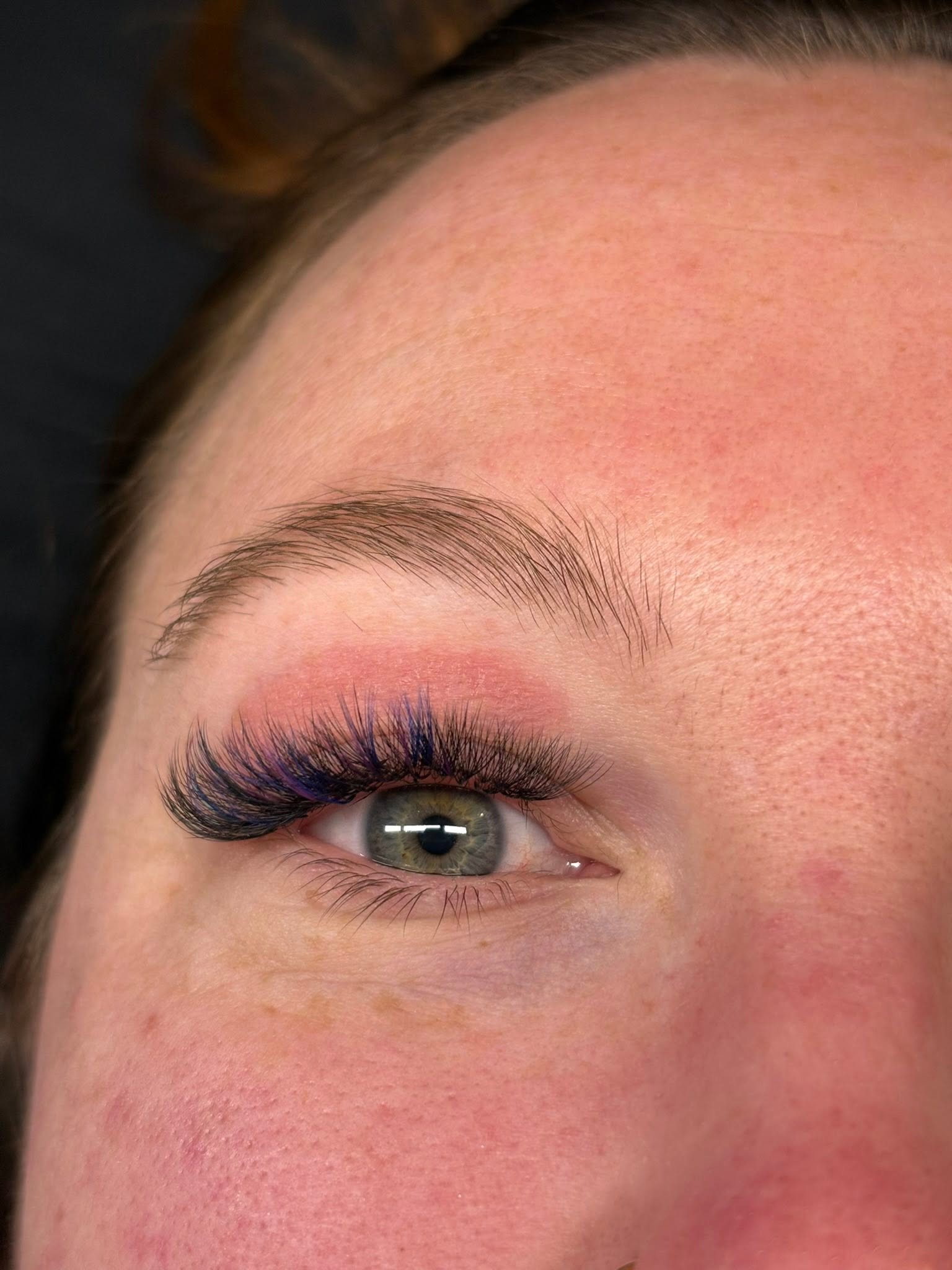 Volume lash set with blue and purple color accents by Ellie